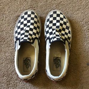 Low rise checkered Vans with brown/ tan strip on back heal. Size women 7.